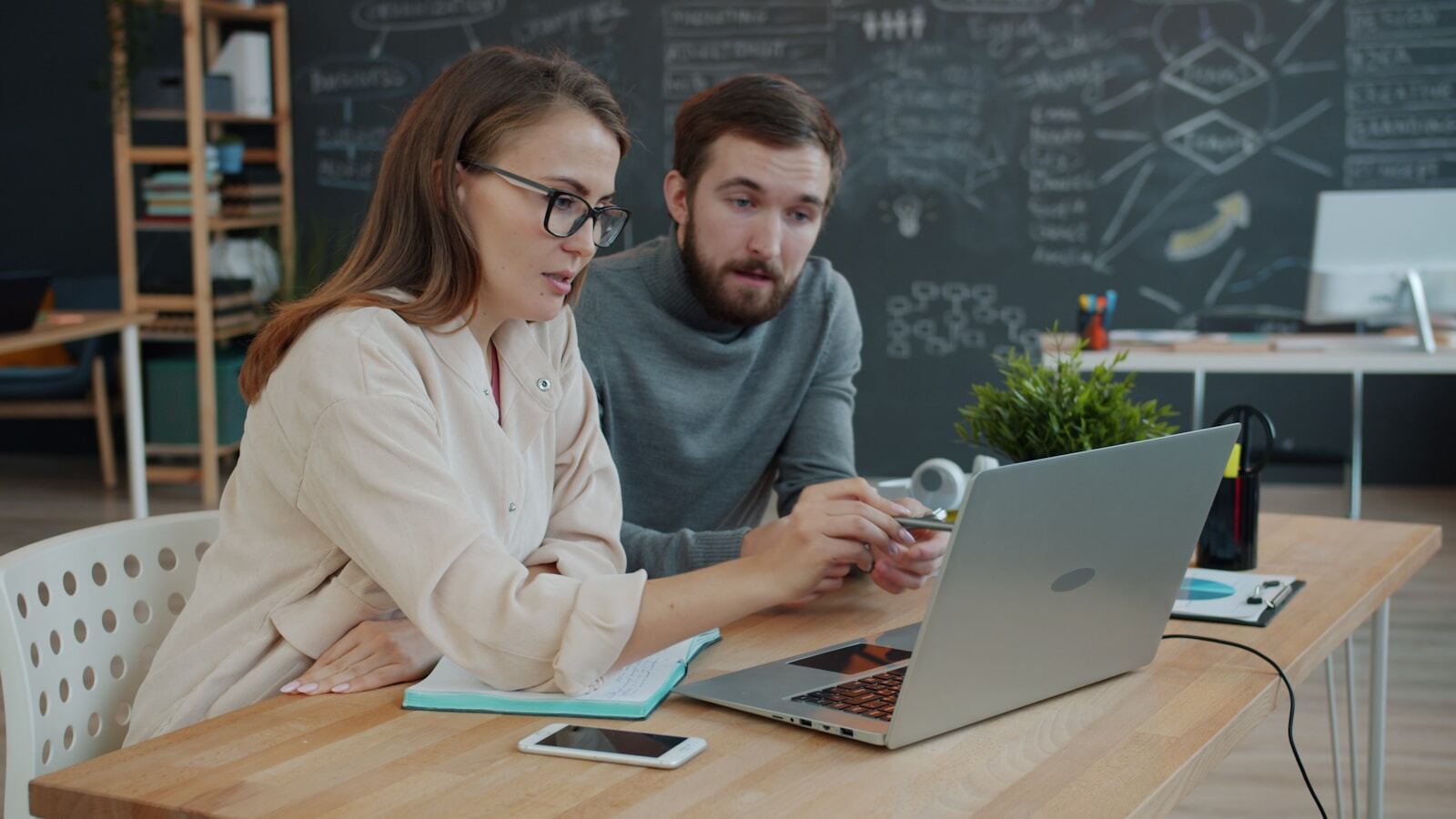 Strategy session: IT advisors collaborating on operations architecture